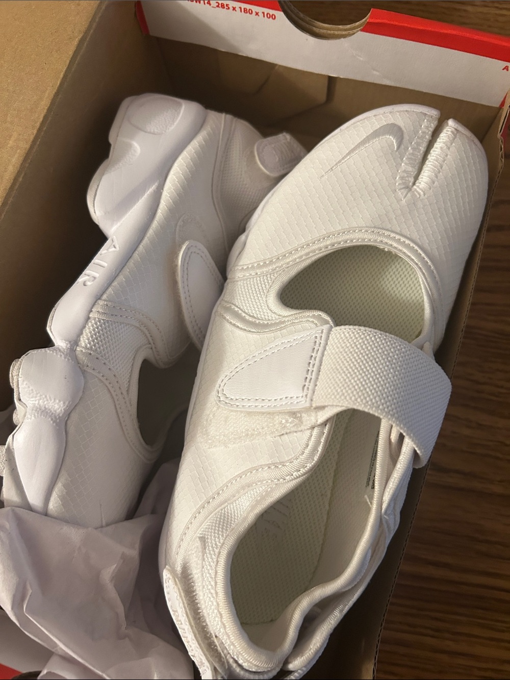 Women’s White Nike Air Rifts